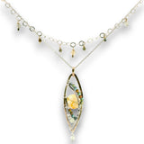 a double layered necklace, the first layer with a Bronze marquise pendant embellished with a faceted citrine coin, prehnite, and turquoise gemstones on sterling silver wire, and the second layer with delicate gemstone charms