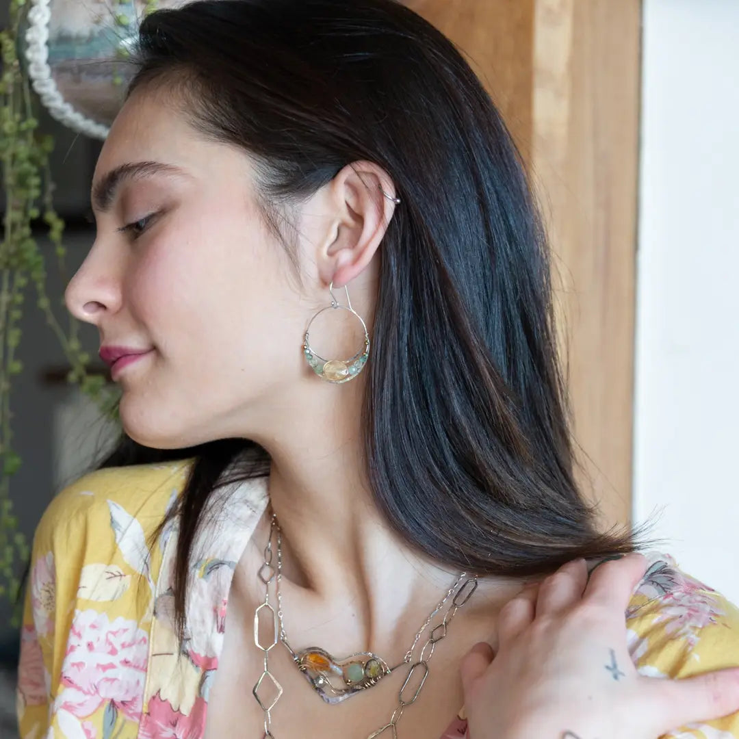 handmade hammered sterling silver moon hoop earrings with a channel with with citrine, prehnite, labradorite and crystal gemstones