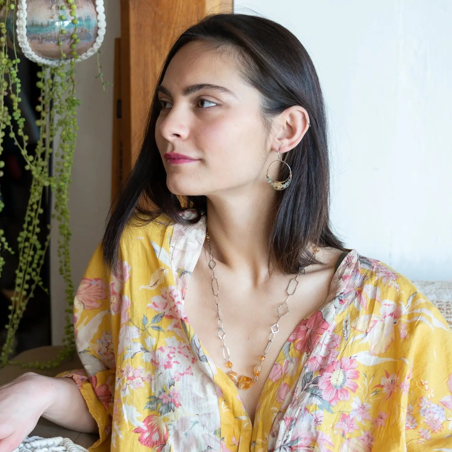 handmade hammered sterling silver moon hoop earrings with a channel with with citrine, prehnite, labradorite and crystal gemstones