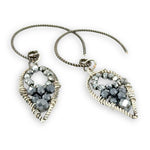 darkened twisted sterling silver mini teardrops filled with pyrite gemstones on our own handmade sterling silver twist hoop earring