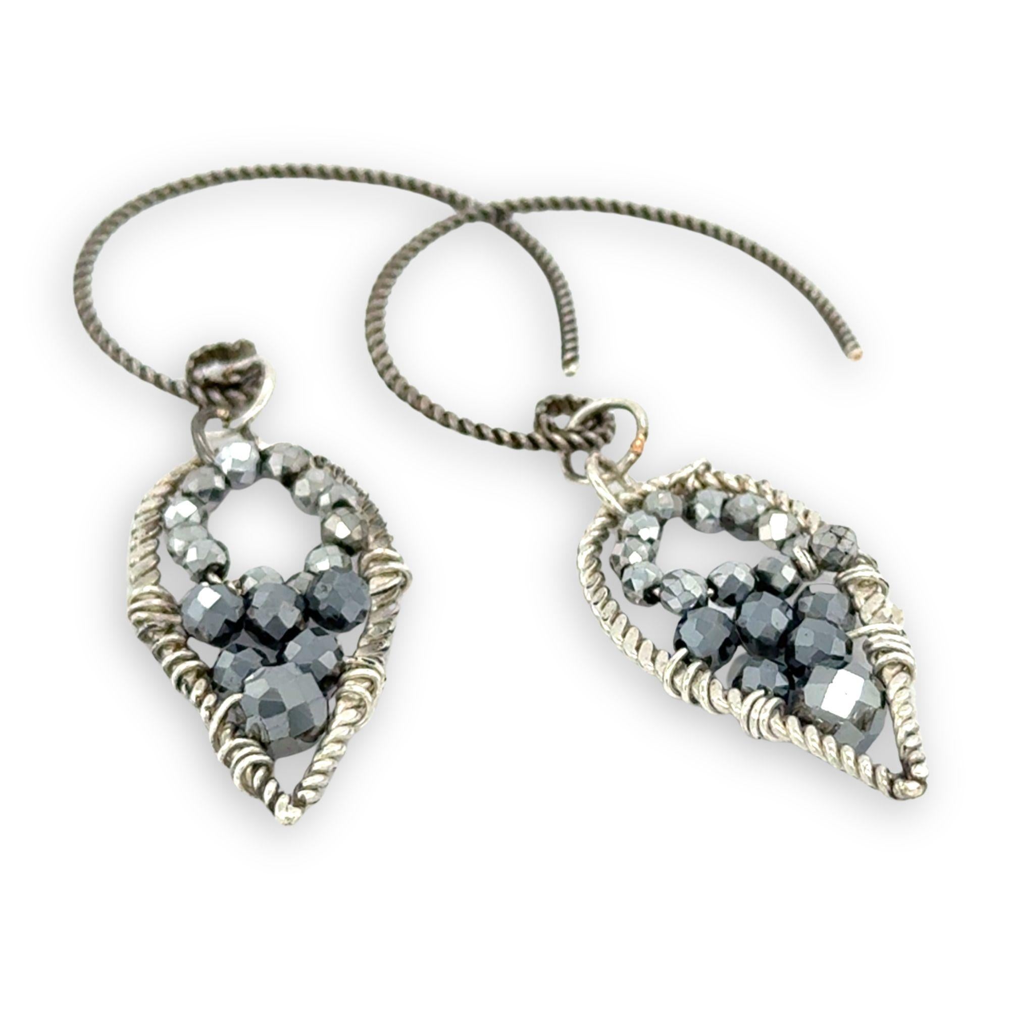 darkened twisted sterling silver mini teardrops filled with pyrite gemstones on our own handmade sterling silver twist hoop earring