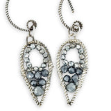 darkened twisted sterling silver mini teardrops filled with pyrite gemstones on our own handmade sterling silver twist hoop earring