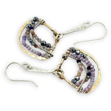 Brass fans suspended by a floral stamped sterling silver paddle with oxidized sterling twist wire, mixed color gemstone, cubic zirconia, and pyrite faceted gemstones