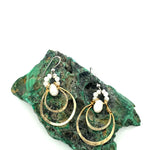 Handmade brass double hoop hanging from moonstone gems and fresh water pearls on gold fill wire