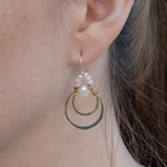 Handmade brass double hoop hanging from moonstone gems and fresh water pearls on gold fill wire