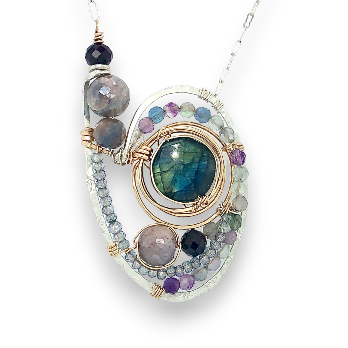 Stamped sterling silver and bronze knot milkyway necklace a flashy labradorite coin, mauve moonstone spheres, garnet sphere, mixed fluorite gemstones, and apatite mini gemstones on gold filled wire