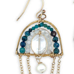 Brass semi circle earrings filled with  chrysocolla, moonstone, and clear quartz gemstones with delicate gold chain and fresh water pearl chanedlier