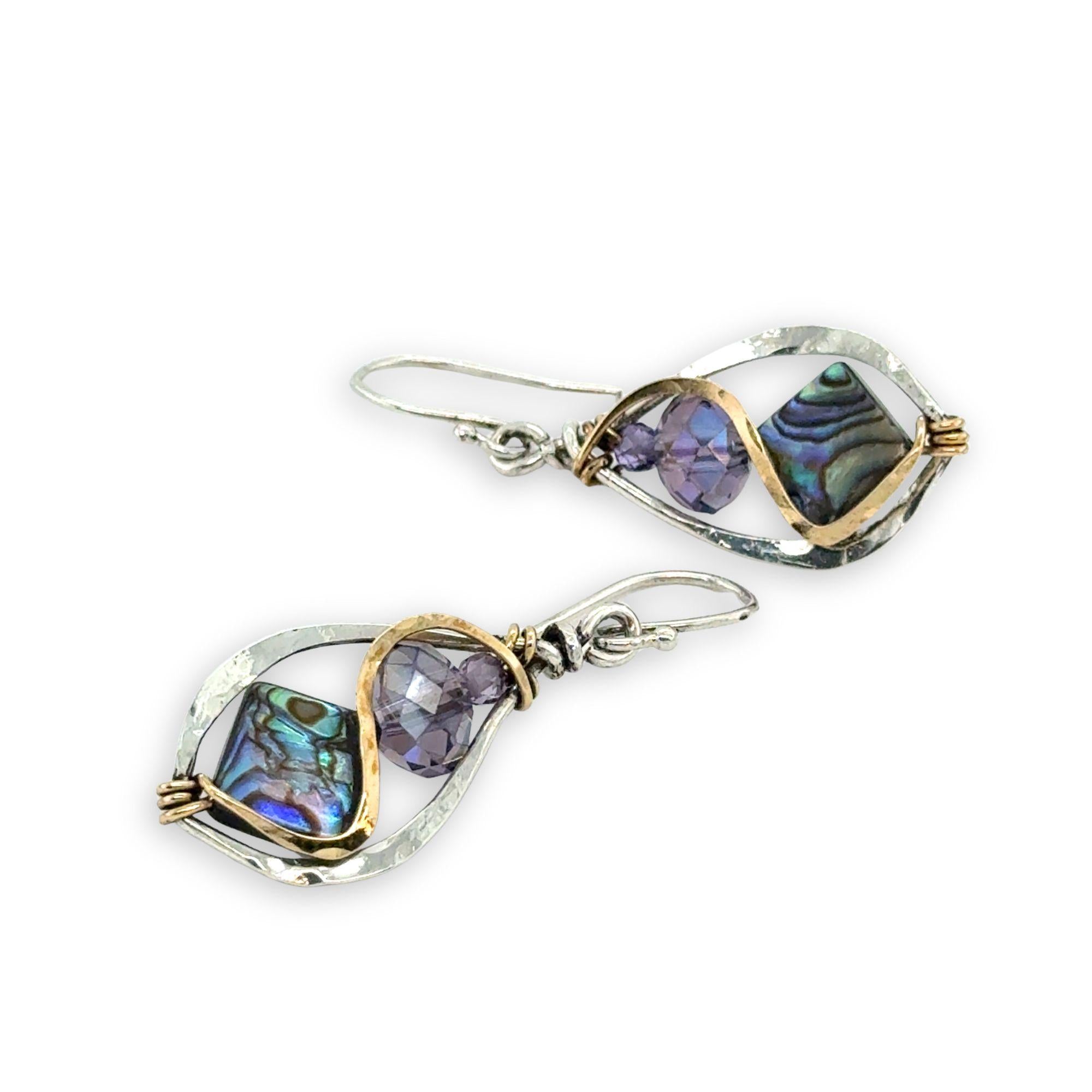 Pair of sterling silver mini marquise earrings with abalone tile gemstones and purple crystal with brass wire
