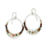 Sterling silver channel hoop earrings with a line of opal, pyrite, green amethyst, and hessonite garnet gemstones on gold filled wire