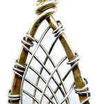 blue green crystal cone inside a brass chapel shaped earring woven with sterling silver fine wire