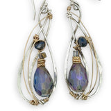 Blue crystal with lapis gemstone on a sterling silver infinity shape earrings accented with gold filled wire