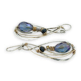 Blue crystal with lapis gemstone on a sterling silver infinity shape earrings accented with gold filled wire