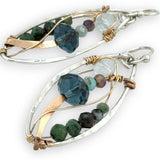 ruby zoisite, aquamarine, amethyst, and crystal gemstones are wrapped in bronze and gold filled wire in mini sterling silver hammered oval earrings