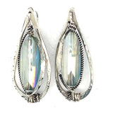 Large mint colored oval crystal within handmade hammered sterling silver drop earrings with built in earring hooks that wear like a post
