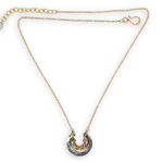 Darkened sterling silver and brass open ring mini pendant with peach cubic zirconia gemstones on gold filled chain necklace