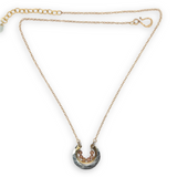 Darkened sterling silver and brass open ring mini pendant with peach cubic zirconia gemstones on gold filled chain necklace