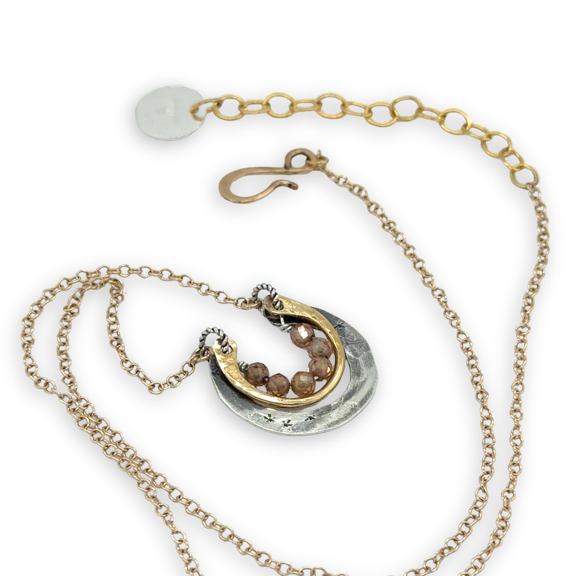 Darkened sterling silver and brass open ring mini pendant with peach cubic zirconia gemstones on gold filled chain necklace