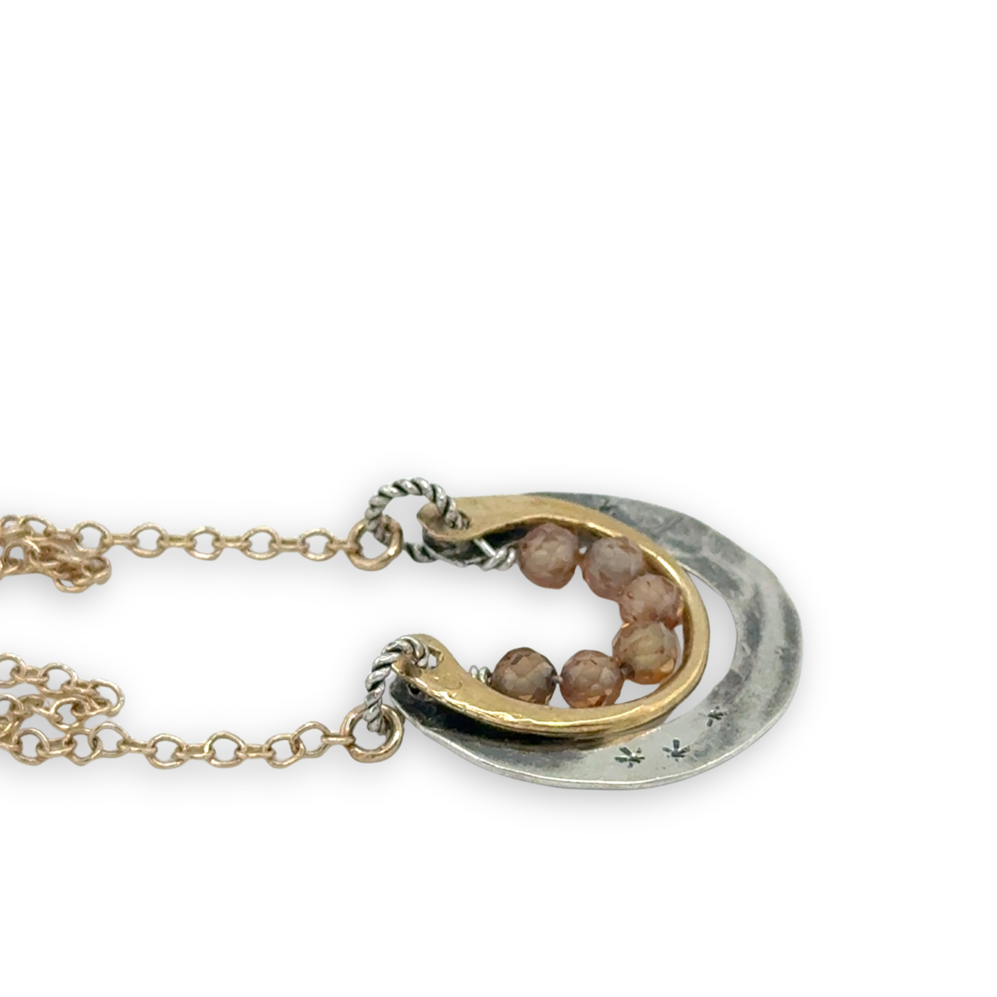 Darkened sterling silver and brass open ring mini pendant with peach cubic zirconia gemstones on gold filled chain necklace