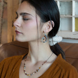 Hammered sterling silver curled earrings lined with ombre mookaite jasper and hessonite garnet gemstones with a rich red fresh water pearl dangle