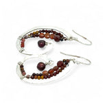 Hammered sterling silver curled earrings lined with ombre mookaite jasper and hessonite garnet gemstones with a rich red fresh water pearl dangle