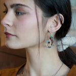 Hammered sterling silver curled earrings lined with ombre mookaite jasper and hessonite garnet gemstones with a rich red fresh water pearl dangle