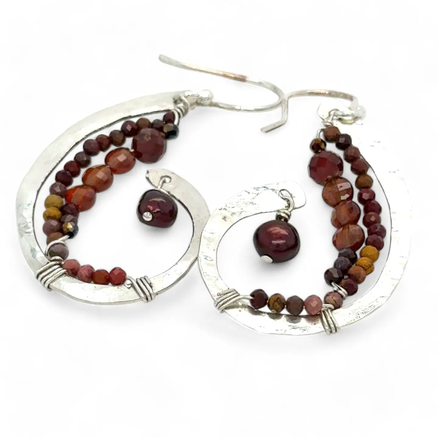 Hammered sterling silver curled earrings lined with ombre mookaite jasper and hessonite garnet gemstones with a rich red fresh water pearl dangle