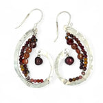 Hammered sterling silver curled earrings lined with ombre mookaite jasper and hessonite garnet gemstones with a rich red fresh water pearl dangle