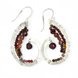 Hammered sterling silver curled earrings lined with ombre mookaite jasper and hessonite garnet gemstones with a rich red fresh water pearl dangle