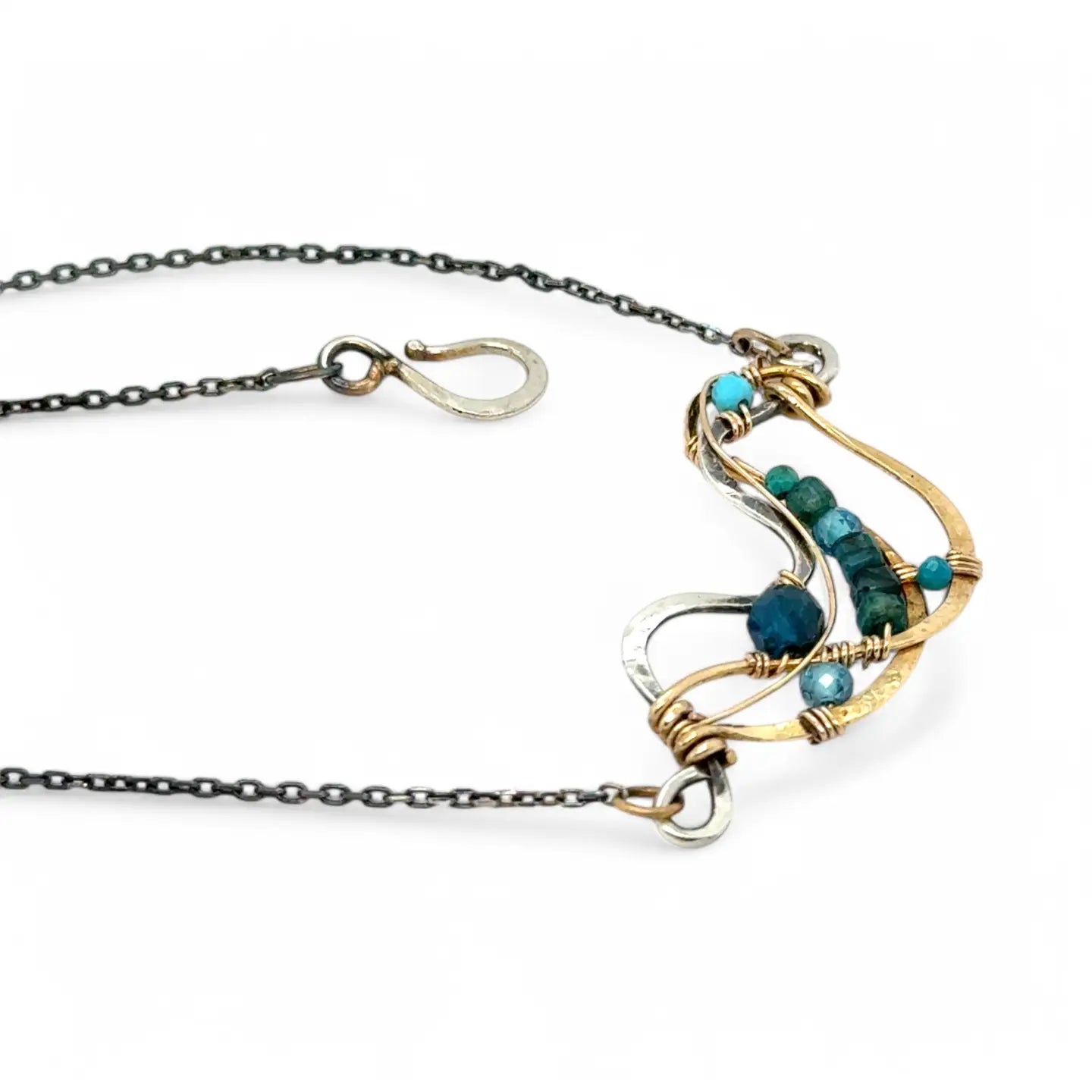Hammered brass and darkened sterling silver waves pendant necklace filled with apatite and turquoise gemstones on gold filled wire 