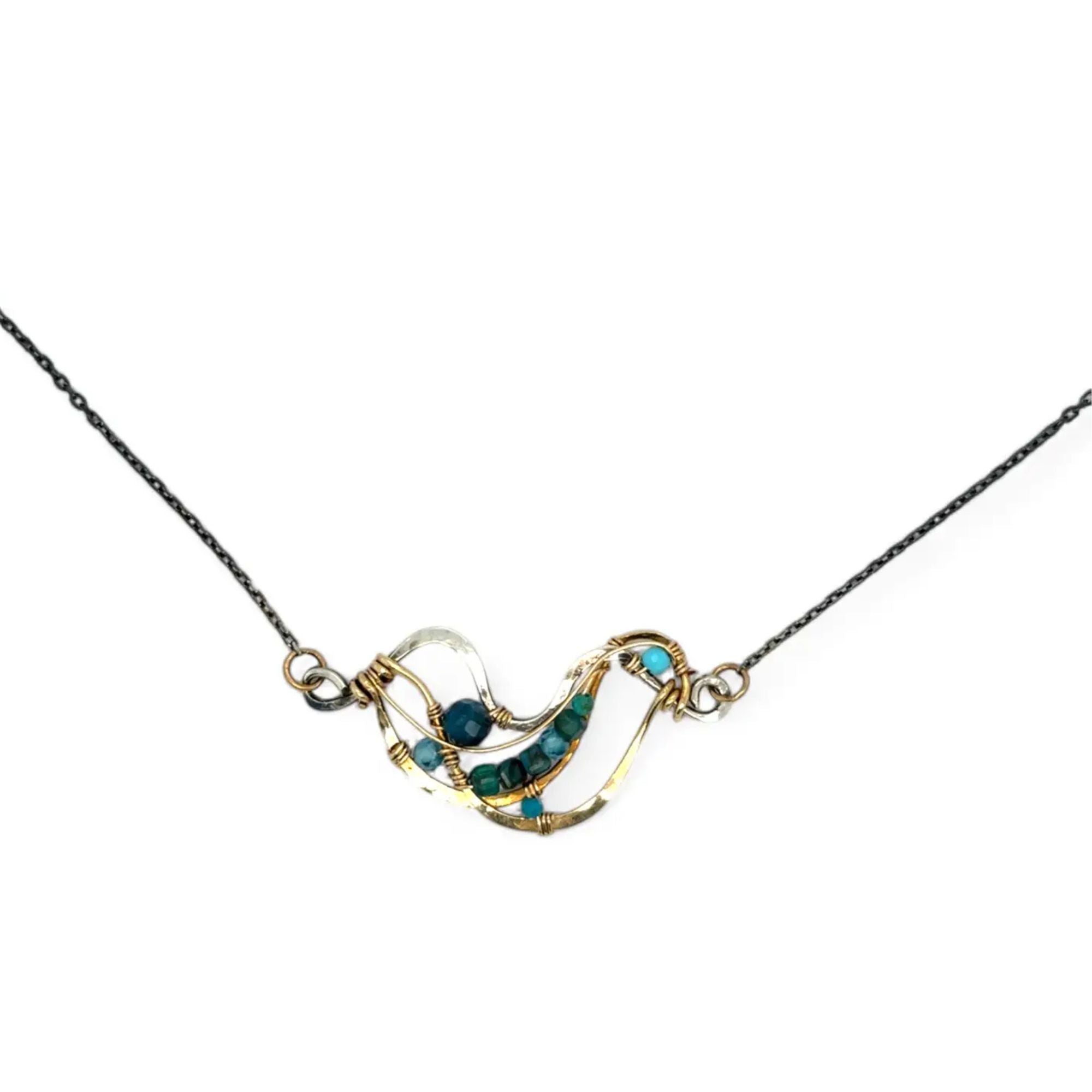 Hammered brass and darkened sterling silver waves pendant necklace filled with apatite and turquoise gemstones on gold filled wire 