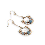 bronze semi circles hanging from find rose gold chain, accented with aquamarine cubes, champagne fresh water pearl, blue crystal and copper crystal cubes