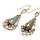 handmade hammered bronze double teardrop earrings with a blue/purple crystal drop lined with champagne fresh water pearls