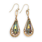 handmade hammered bronze double teardrop earrings with a blue/purple crystal drop lined with champagne fresh water pearls