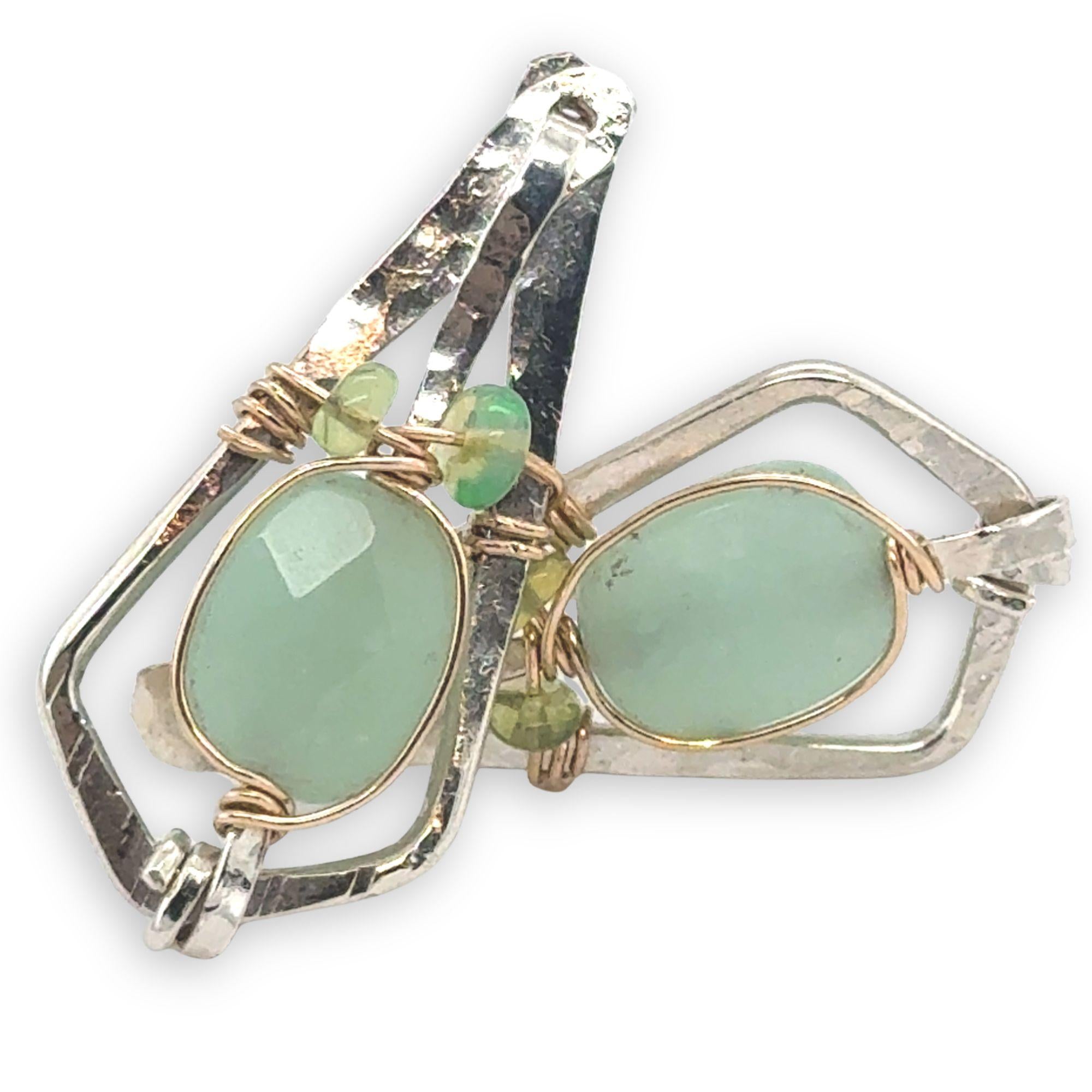 Sterling silver mini kite shaped earrings with jade and green opal gemstones wrapped in gold filled wire with a built in sterling silver earring hooks that wears like a post earring