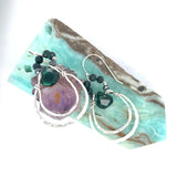 Double sterling silver hoop earrings hanging from bloodstone faceted gemstones with a dark green drop hanging in the center