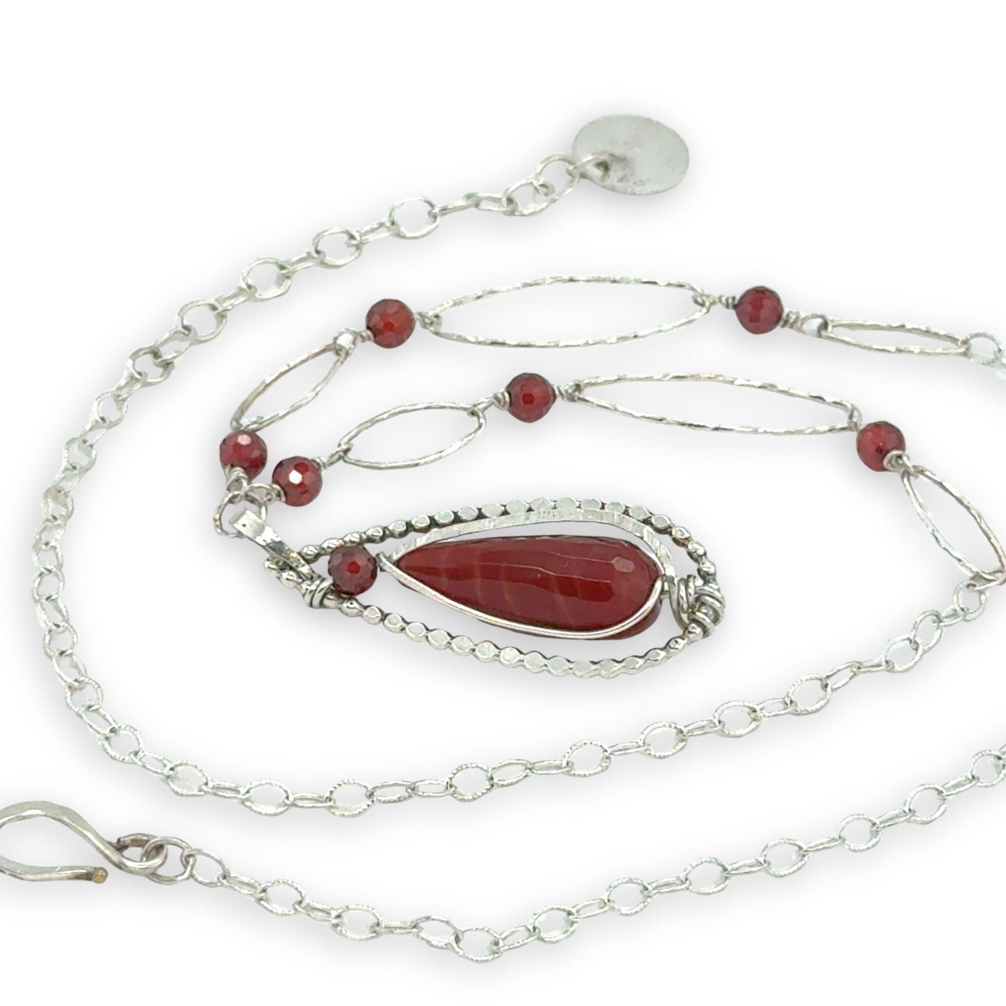red fire agate drop gemstone held in sterling silver dot wire teardrop pendant necklace with cubic zirconia and sparkly sterling link accents