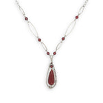 red fire agate drop gemstone held in sterling silver dot wire teardrop pendant necklace with cubic zirconia and sparkly sterling link accents