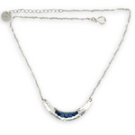 Silver necklace with a crescent moon-shaped pendant featuring blue kyanite cubes and lapis faceted gemstones on heart chain sterling silver chain necklace