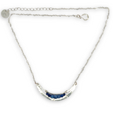 Silver necklace with a crescent moon-shaped pendant featuring blue kyanite cubes and lapis faceted gemstones on heart chain sterling silver chain necklace
