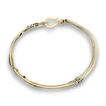 Handmade stamped brass skinny bracelet braided with oxidized sterling silver and gold filled wires