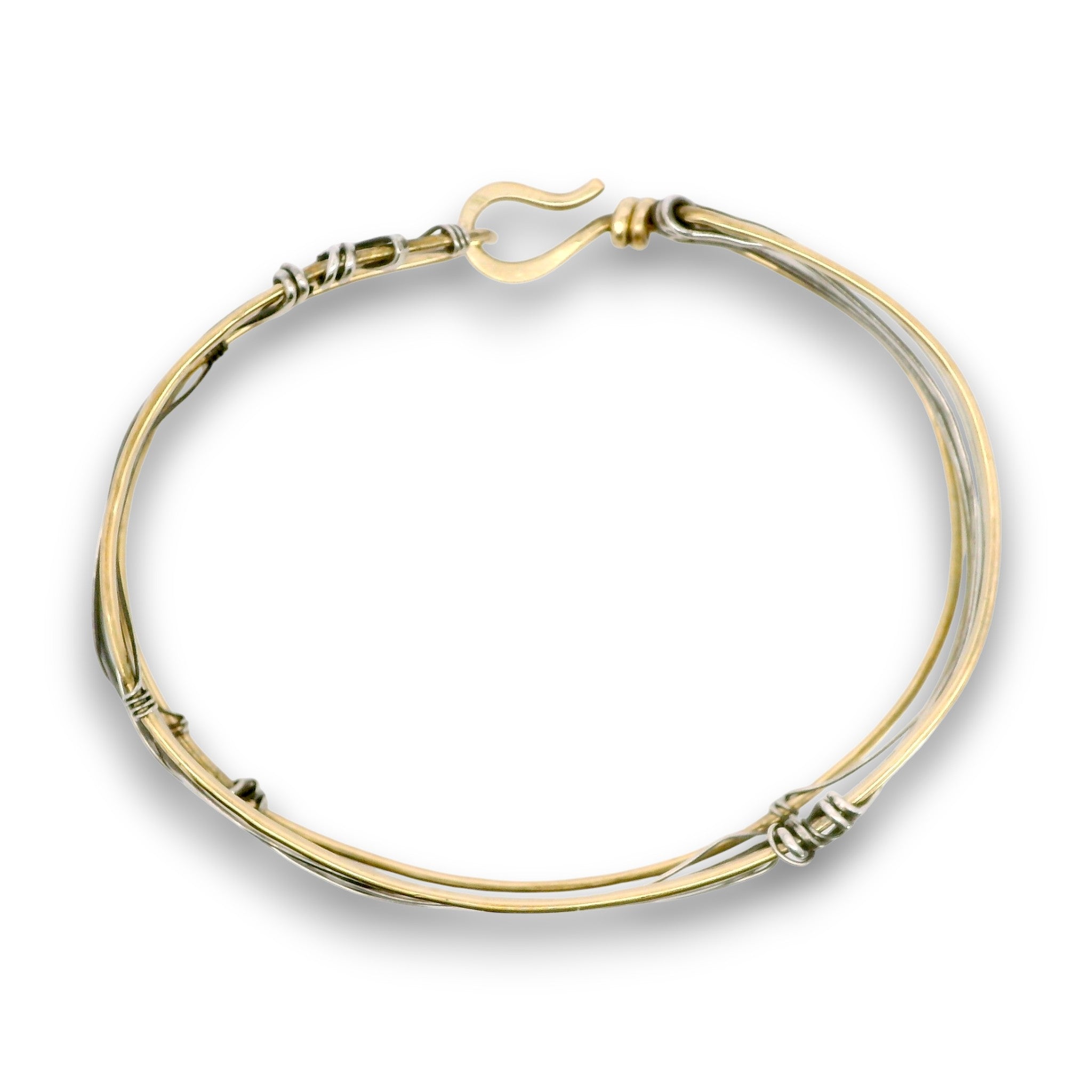 Handmade stamped brass skinny bracelet braided with oxidized sterling silver and gold filled wires