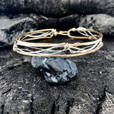 Handmade stamped brass skinny bracelet braided with oxidized sterling silver and gold filled wires