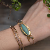 Handmade stamped brass skinny bracelet braided with oxidized sterling silver and gold filled wires