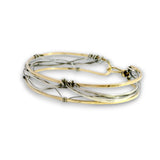 Handmade stamped brass skinny bracelet braided with oxidized sterling silver and gold filled wires