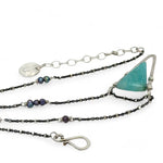 Amazonite faceted point inside a hammered sterling silver pointed pendant necklace on oxidized sterling dot chain with purple fresh water pearl accents