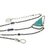 Amazonite faceted point inside a hammered sterling silver pointed pendant necklace on oxidized sterling dot chain with purple fresh water pearl accents