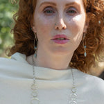 Sterling silver marquise shaped earrings with blue agate, amazonite, and apatite gemstones, featuring a disco ball design.