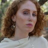 Handmade hammered large oval links held together with delicate sterling silver barrel tube chain to form long necklace that can be worn at any length