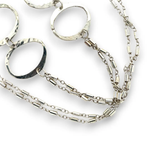 Handmade hammered large oval links held together with delicate sterling silver barrel tube chain to form long necklace that can be worn at any length