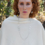 Handmade hammered large oval links held together with delicate sterling silver barrel tube chain to form long necklace that can be worn at any length